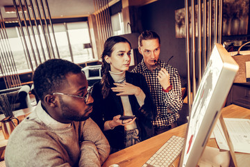 Emotional brunette girl demonstrating her position in work