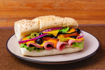 Sandwich, hamburger, with cheese, meat, sausage, lettuce, tomato, burger