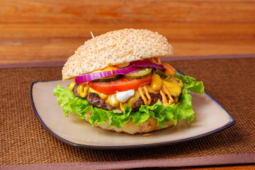 Sandwich, hamburger, with cheese, meat, sausage, lettuce, tomato, burger