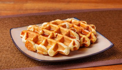 Waffles on a plate on the table