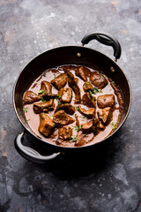 Mutton Liver fry or Kaleji masala, popular Non vegetarian recipe from India and Pakistan. served dry or with curry in a bowl, karahi or plate