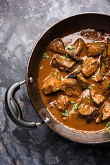 Mutton Liver fry or Kaleji masala, popular Non vegetarian recipe from India and Pakistan. served dry or with curry in a bowl, karahi or plate