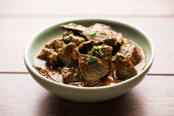 Mutton Liver fry or Kaleji masala, popular Non vegetarian recipe from India and Pakistan. served dry or with curry in a bowl, karahi or plate
