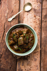 Mutton Liver fry or Kaleji masala, popular Non vegetarian recipe from India and Pakistan. served dry or with curry in a bowl, karahi or plate