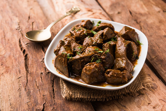 Mutton Liver fry or Kaleji masala, popular Non vegetarian recipe from India and Pakistan. served dry or with curry in a bowl, karahi or plate