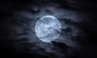 Naklejka na ściany i meble Full moon on a cloudy night