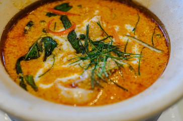 Thai red curry soup close up