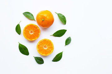 Fototapeta na wymiar Orange fruits with leaves on white background.