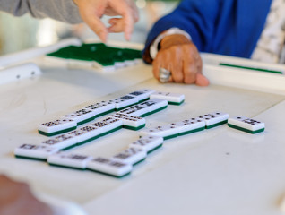 Fototapeta premium Playing with Dominoes
