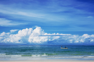 Fototapeta na wymiar Blue sea and fishermen with sky.