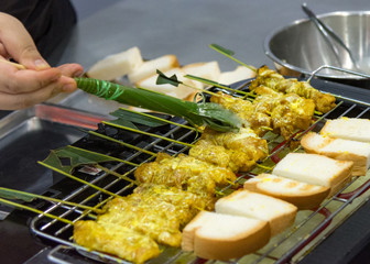 Naklejka premium Satay, Grilled Pork satay with toast, Asian food