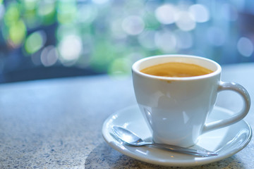 White coffee cup on table