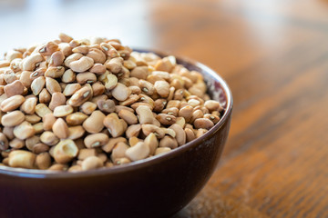 Raw nigerian brown beans in a bowl