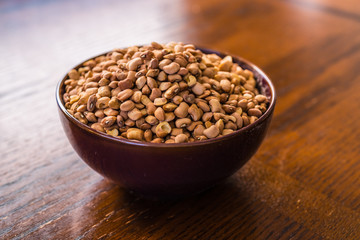 Raw nigerian brown beans in a bowl