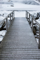 Fototapeta premium Snow frost on wood bridge