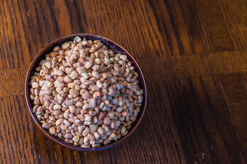 Raw nigerian brown beans in a bowl