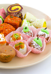 Indian Traditional Mix Sweet Food or Mix Mithai include Peda, Mawa Burfi, Dry Fruits Sweet, Halwa or Coconut Burfi