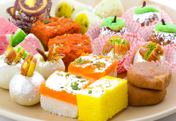 Indian Traditional Mix Sweet Food or Mix Mithai include Peda, Mawa Burfi, Dry Fruits Sweet, Halwa or Coconut Burfi