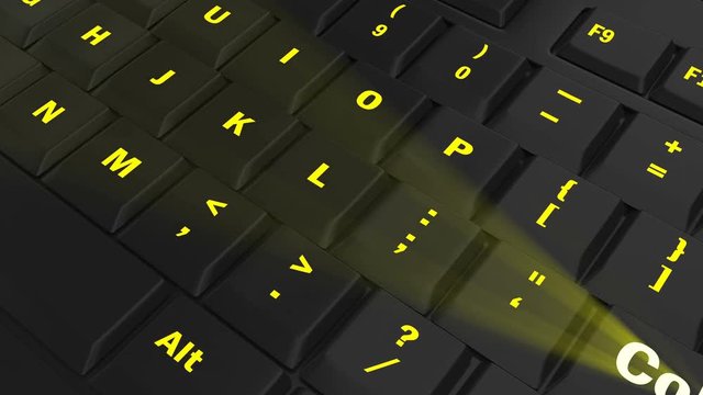 pointing the camera on yellow glowing Collect key on black computer keyboard