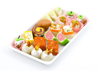 Indian Traditional Mix Sweet Food or Mix Mithai include Peda, Mawa Burfi, Dry Fruits Sweet, Halwa or Coconut Burfi