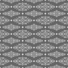 Vector Seamless Pattern in Ethnic Style. Creative tribal endless ornament, perfect for textile design, wrapping paper, wallpaper or site background. Trendy hand drawn boho tile.