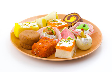 Indian Traditional Mix Sweet Food or Mix Mithai include Peda, Mawa Burfi, Dry Fruits Sweet, Halwa or Coconut Burfi