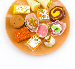 Indian Traditional Mix Sweet Food or Mix Mithai include Peda, Mawa Burfi, Dry Fruits Sweet, Halwa or Coconut Burfi