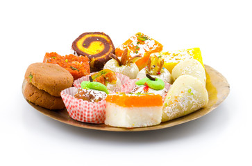 Indian Traditional Mix Sweet Food or Mix Mithai include Peda, Mawa Burfi, Dry Fruits Sweet, Halwa or Coconut Burfi