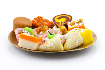 Indian Traditional Mix Sweet Food or Mix Mithai include Peda, Mawa Burfi, Dry Fruits Sweet, Halwa or Coconut Burfi