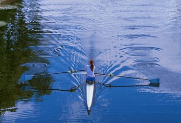 Lone rower training on the river © Rob