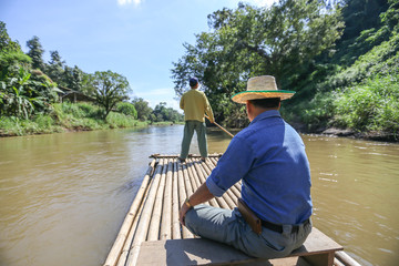 Bamboo rafting on river in jungle, Chiang Mai 