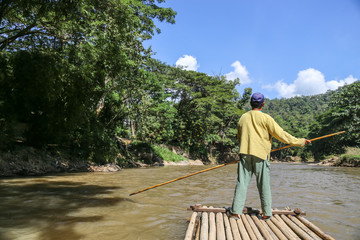 Bamboo rafting on river in jungle, Chiang Mai