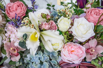 Close up group of white  green pink and purple  flowers and leaves in colorful tone.