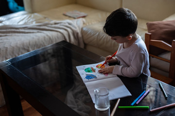  little boy drawing aliens