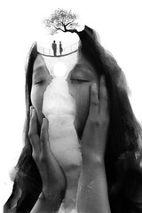 Paintography. Double exposure portrait combined with hand drawn painting tells a story of lovers remembered by lonely young female with hands on the face