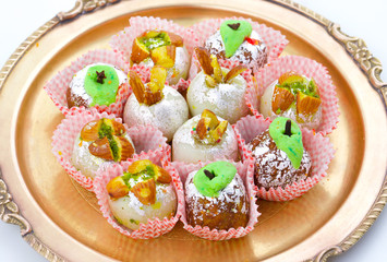 Indian Traditional Mix Sweet Food or Mix Mithai include Peda, Mawa Burfi, Dry Fruits Sweet, Halwa or Coconut Burfi