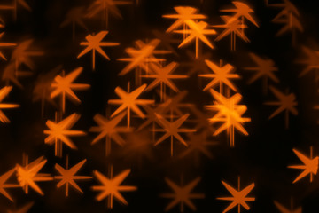 Blurred view of beautiful lights on dark background