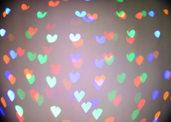 Blurred view of beautiful lights on dark background