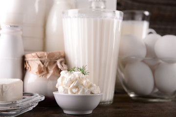 Different milk products on wooden table
