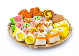 Indian Traditional Mix Sweet Food or Mix Mithai include Peda, Mawa Burfi, Dry Fruits Sweet, Halwa or Coconut Burfi