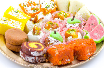 Indian Traditional Mix Sweet Food or Mix Mithai include Peda, Mawa Burfi, Dry Fruits Sweet, Halwa or Coconut Burfi