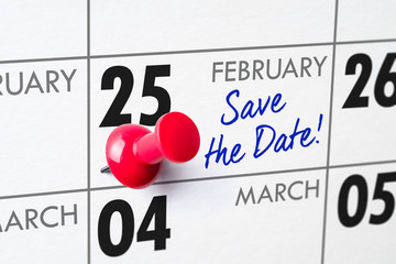 Wall calendar with a red pin - February 25