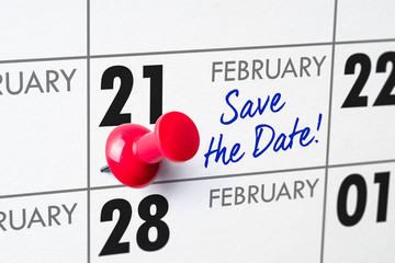 Wall calendar with a red pin - February 21