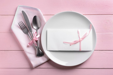 Beautiful table setting on wooden background