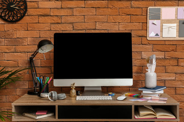 Modern workplace of designer in interior of room