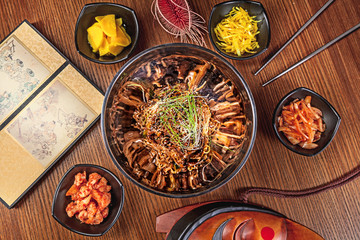 Top view Chinese noodle with kimchi and seafood. Korean cuisine. Asian food. Traditional korean cuisine set. Picture for recipe. Copy space for text logo or brand.