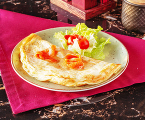 Omelette, fried eggs for breakfast