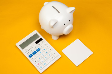 Piggy bank and calculator