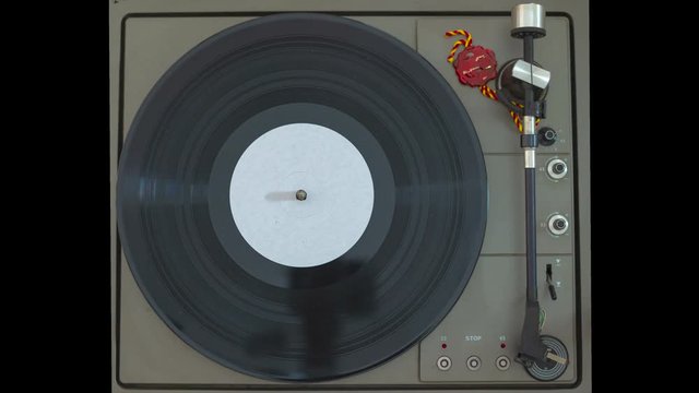 Stop turntable of the plate at 33 rpm and automatic return of the arm