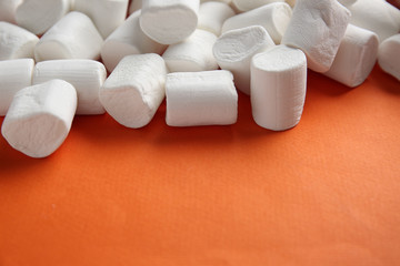 Tasty marshmallow on color background